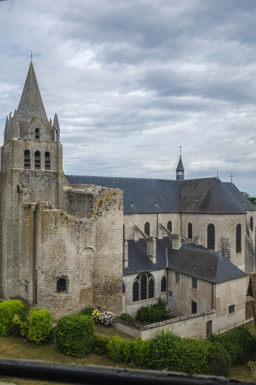 the building has many windows and is built in stone