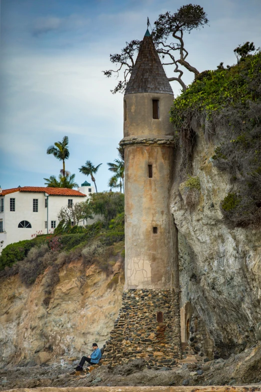 a large tower sitting on top of a cliff