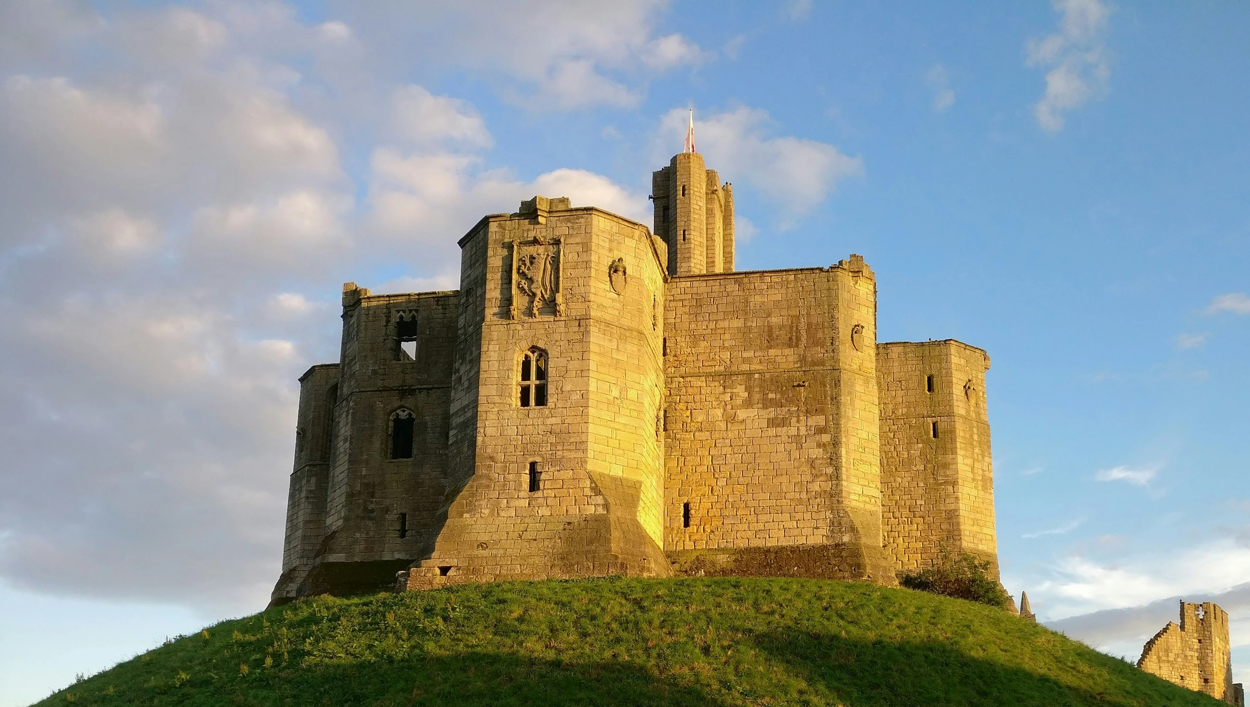 this castle is perched on a small hill