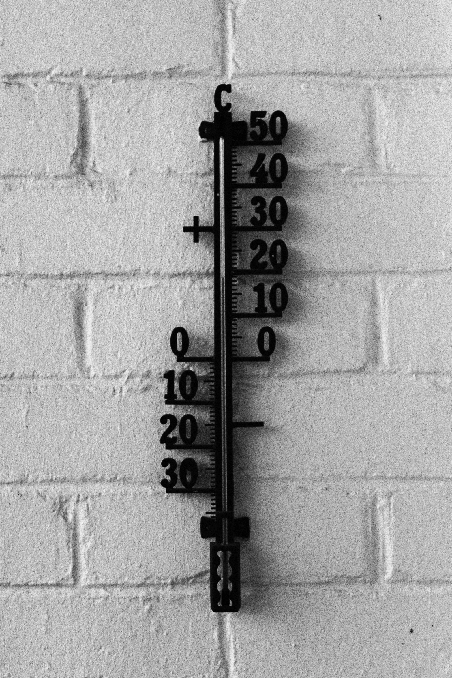 a measuring pole on the side of a wall