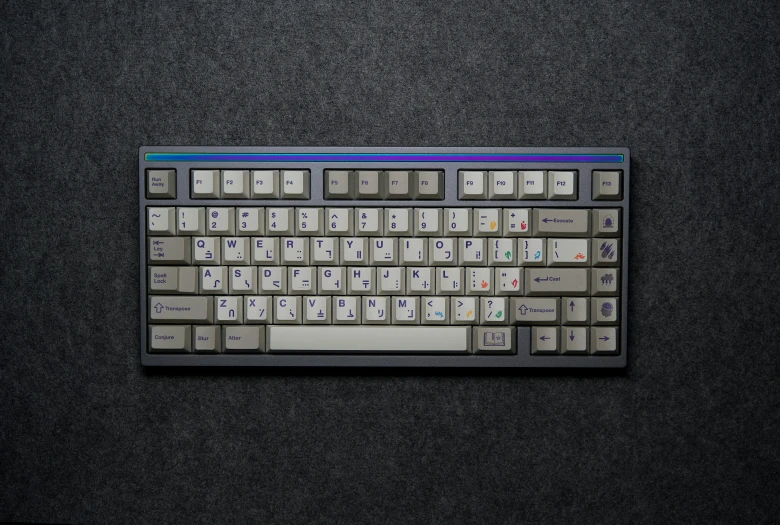 a keyboard with keys and multi - colored keys is pographed on a black surface