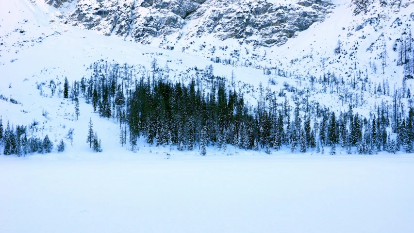 a big mountain covered in lots of snow