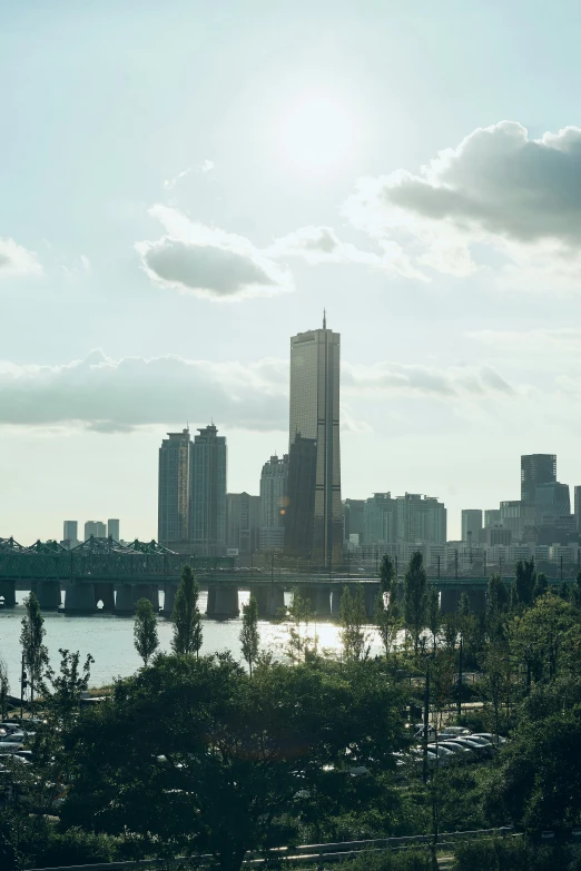 some tall buildings on a large body of water