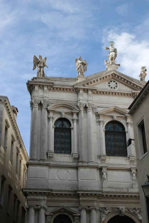 looking up at an old gothic building in the city