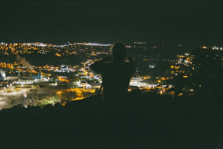 a night view of a town lit up by city lights