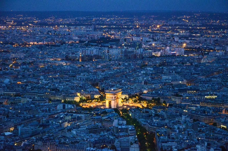 the city at night seen from the eiffel tower