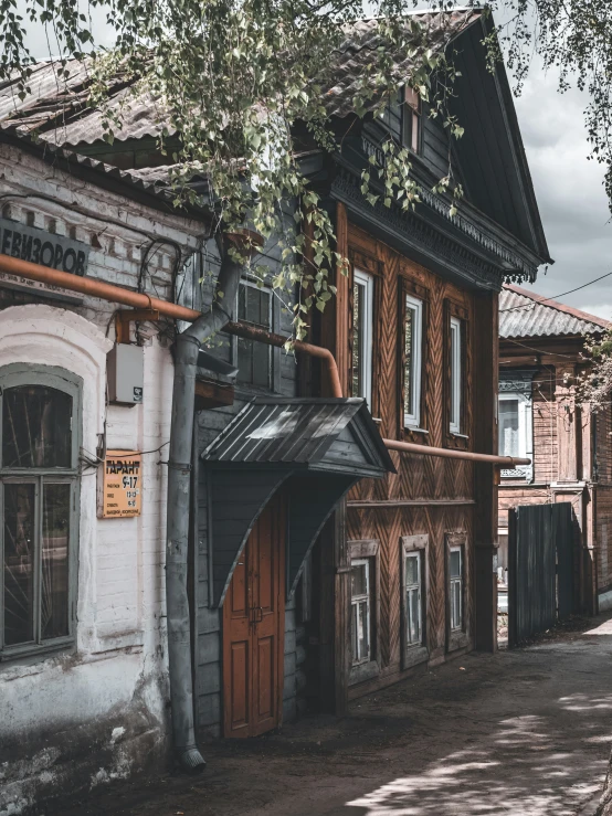 an old building with a few old doors in front