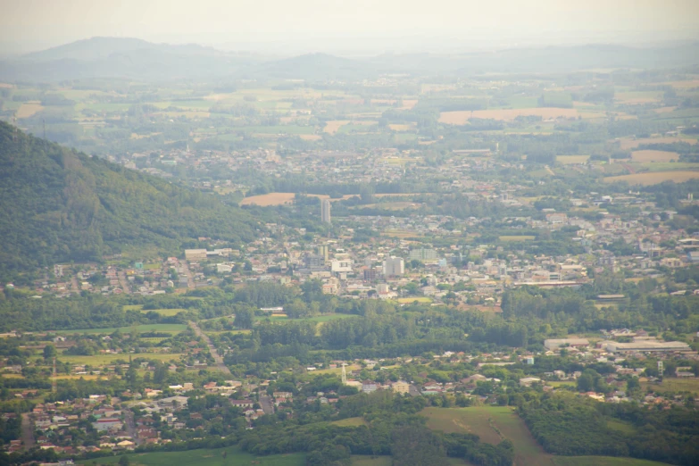 a small town and surrounding farmland, taken from an airplane