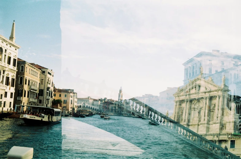 a street scene with some buildings and a waterway