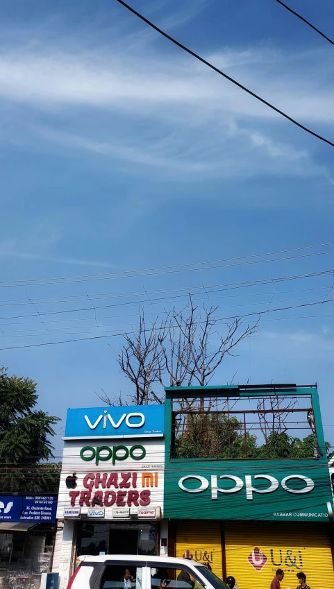 a large truck in front of an outdoor business