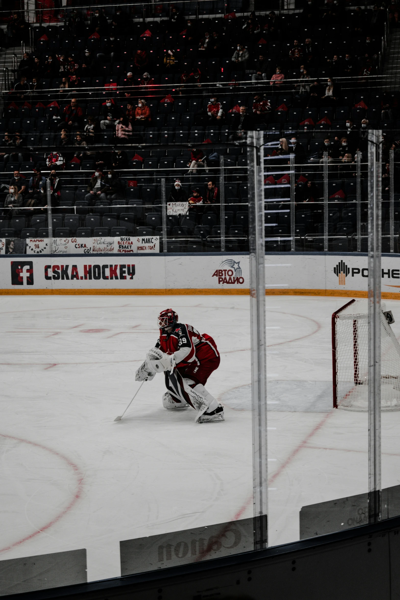 there are some hockey players playing on the ice