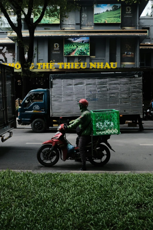 a person is riding a motorcycle down the street