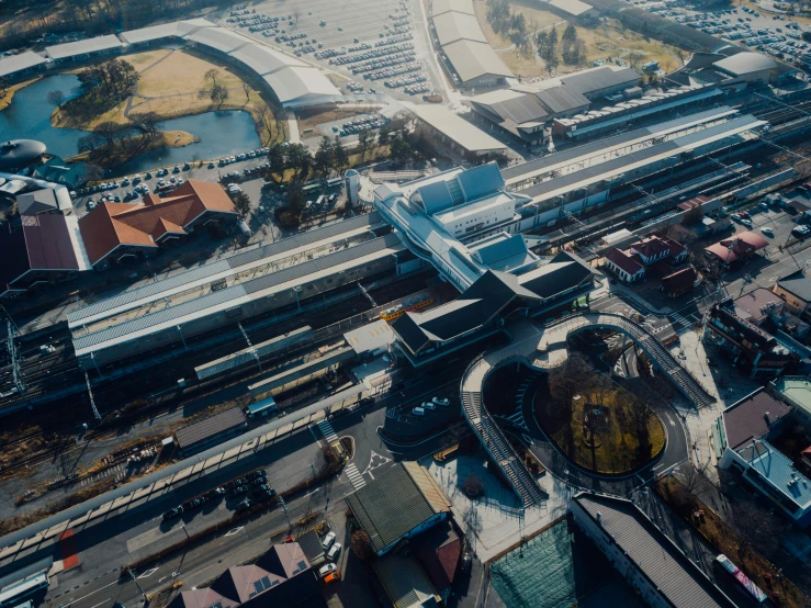 a railway station surrounded by many train tracks