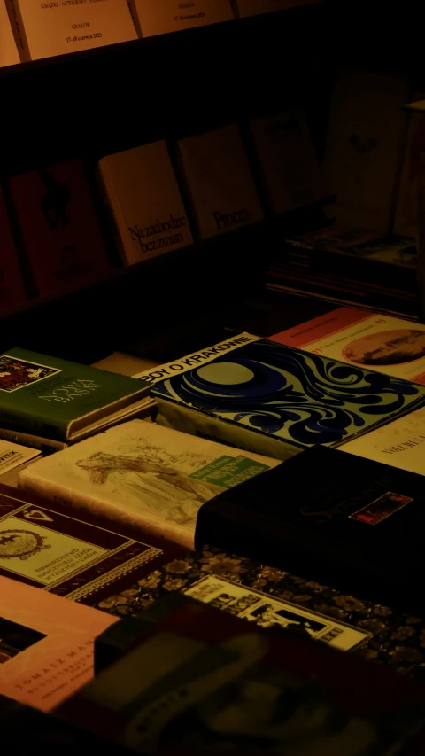 a number of books on top of a table