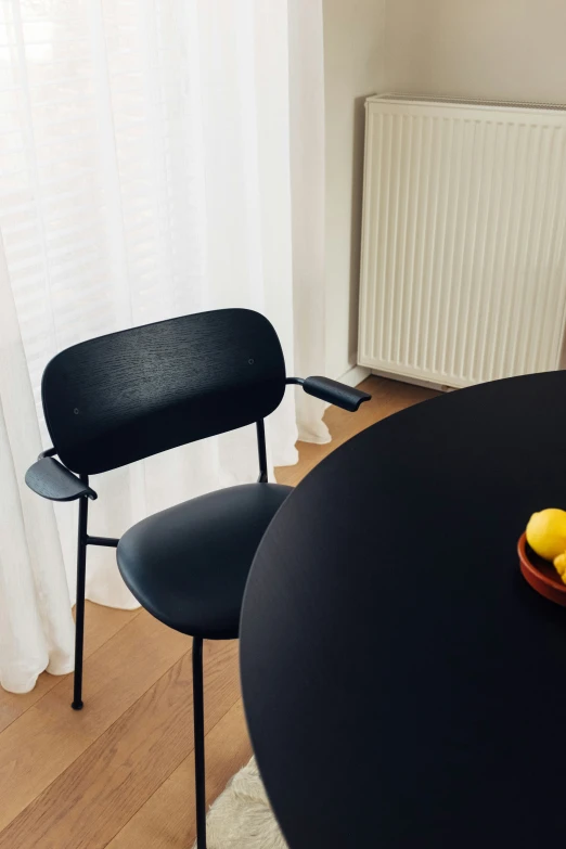 a dining table with some fruit on top of it