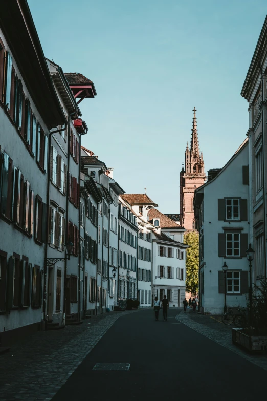 a long narrow street with buildings lining it