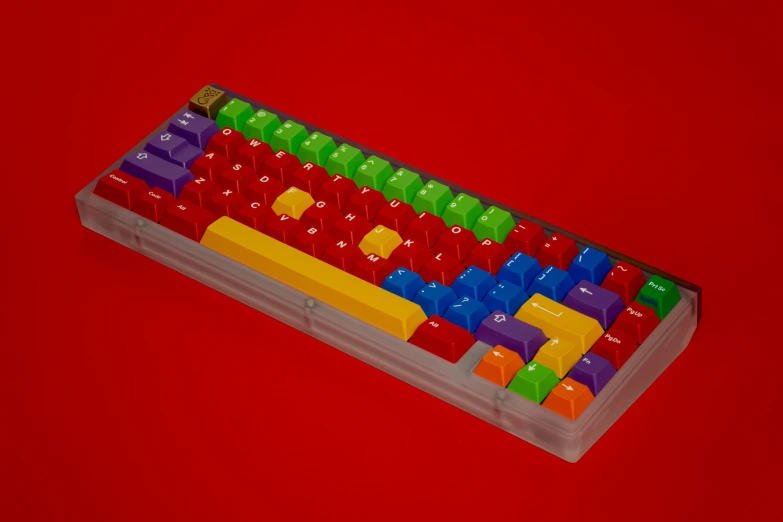 this is a computer key board with colorful keys