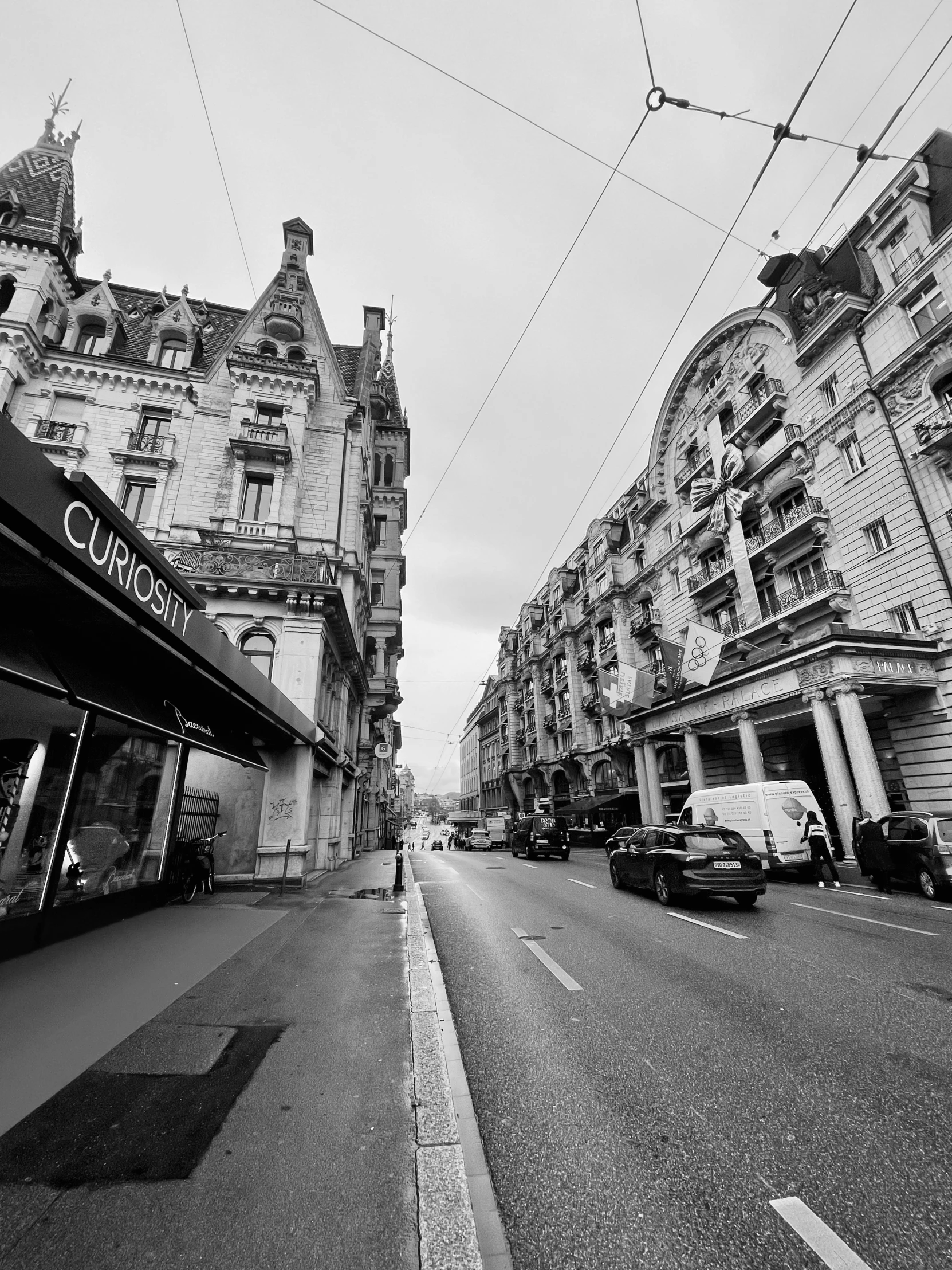 a wide city street lined with tall buildings