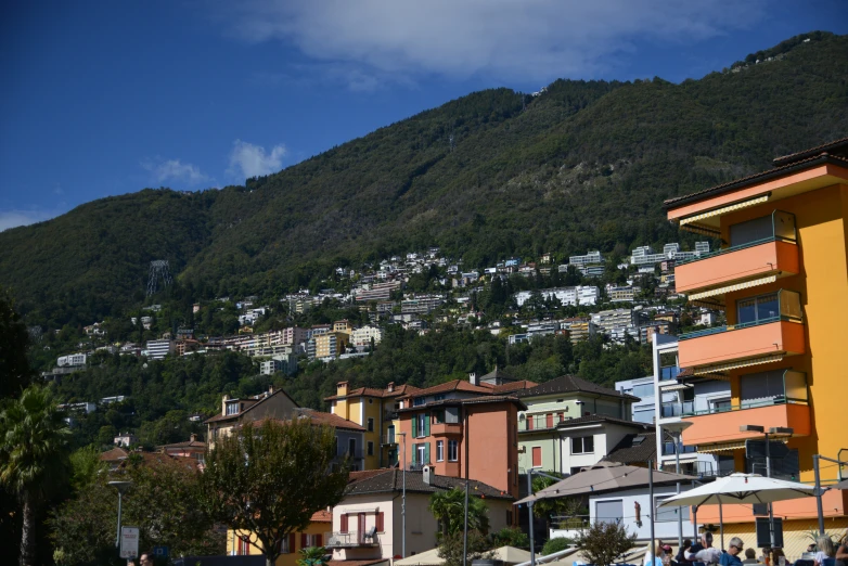 buildings stand along the waterfront of a town