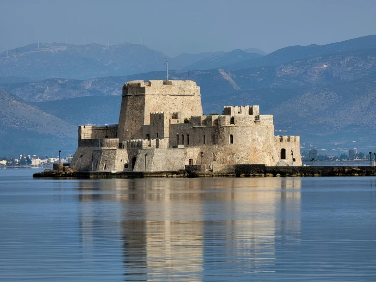 the castle looks like it is on land in an island