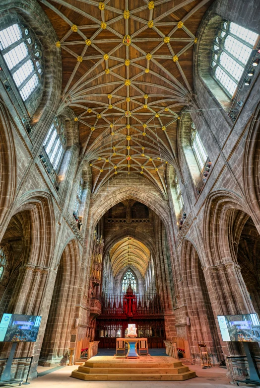 the inside of a cathedral with several tall ceilings