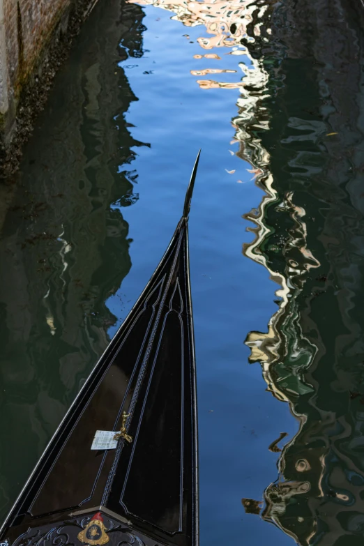 an ornamental boat in front of the water