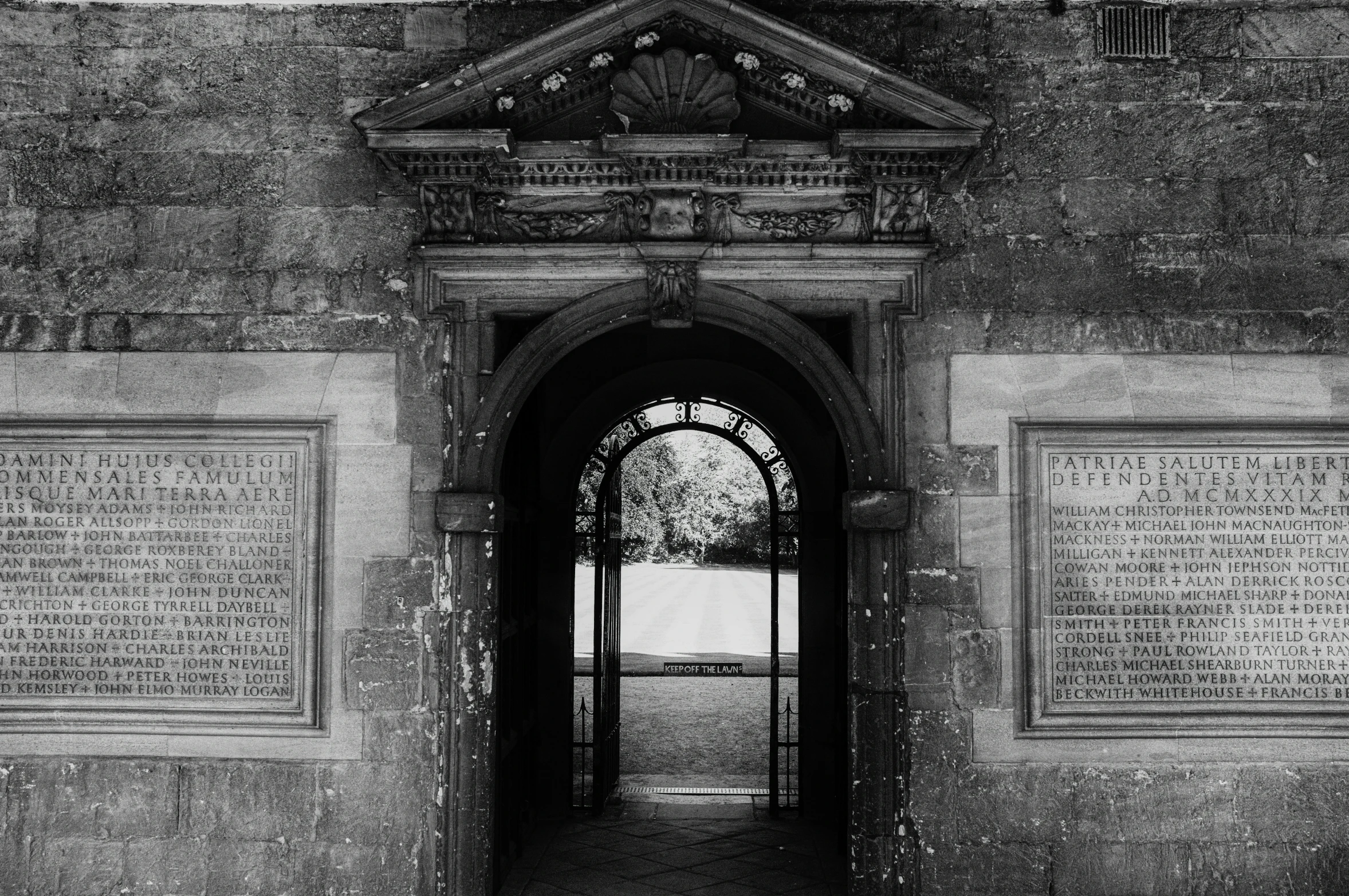 the inside of a building with several pillars and arched windows