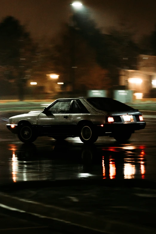 the car is stopped at a traffic light at night