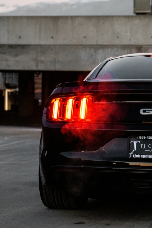 a car with a rear light shining red