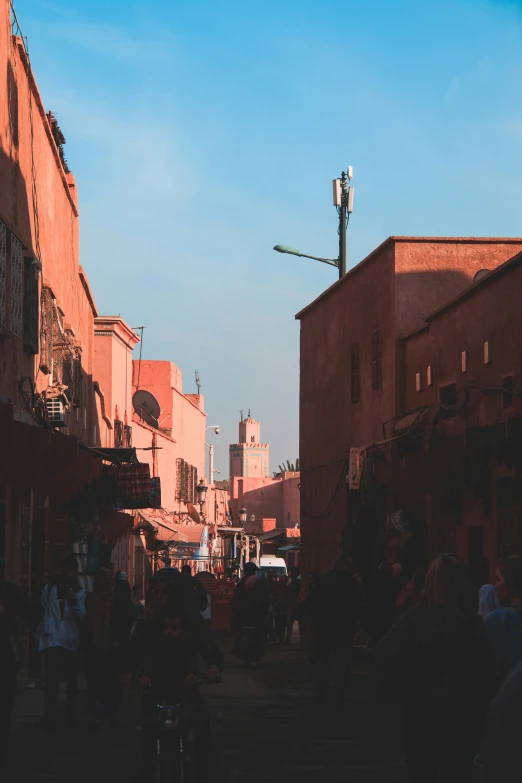 a street is full of people walking down it