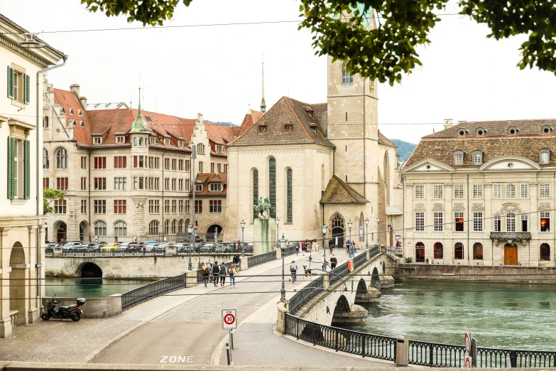 a street lined with buildings next to a river