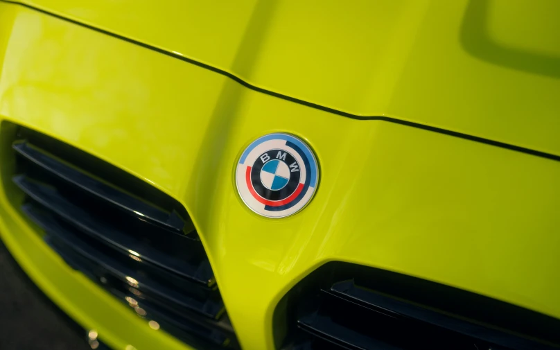 a close - up view of the grilles on a lime green sport car