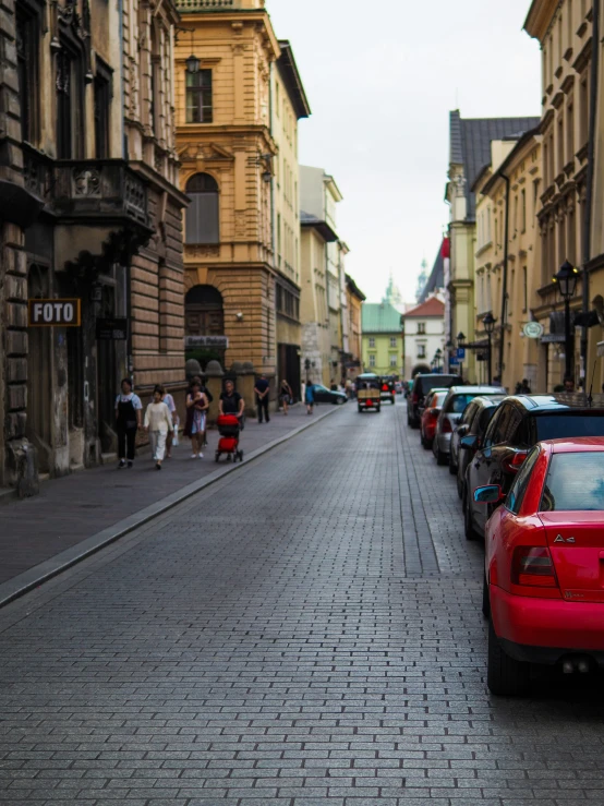 a bunch of cars parked in the streets of a city