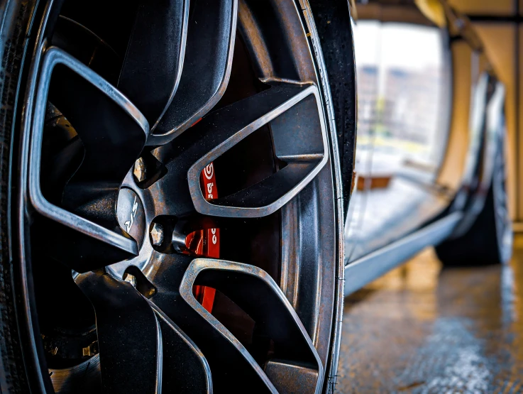 a close - up of a tire and spokes on a vehicle