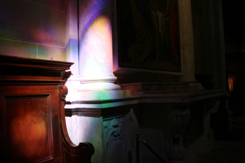 some light coming through the stained glass windows