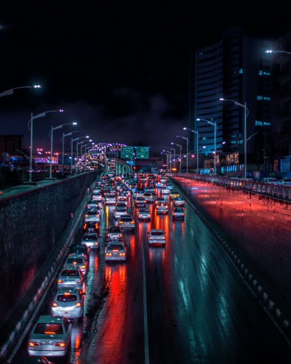a nighttime city skyline filled with traffic