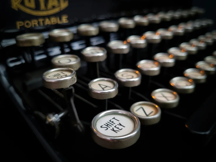 a keyboard with multiple keys and numbers with both of the letters on it