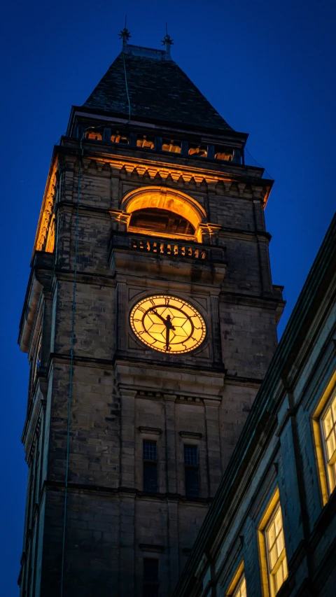 a large tall tower with a clock at the top