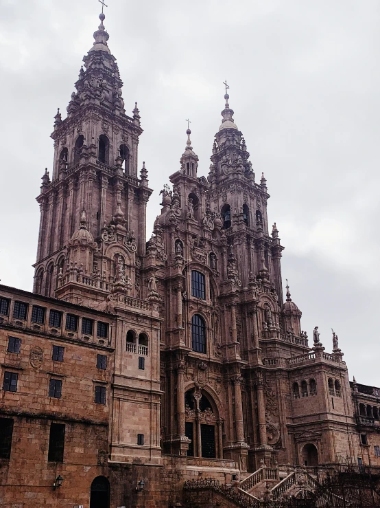 an old castle like building with two steeples