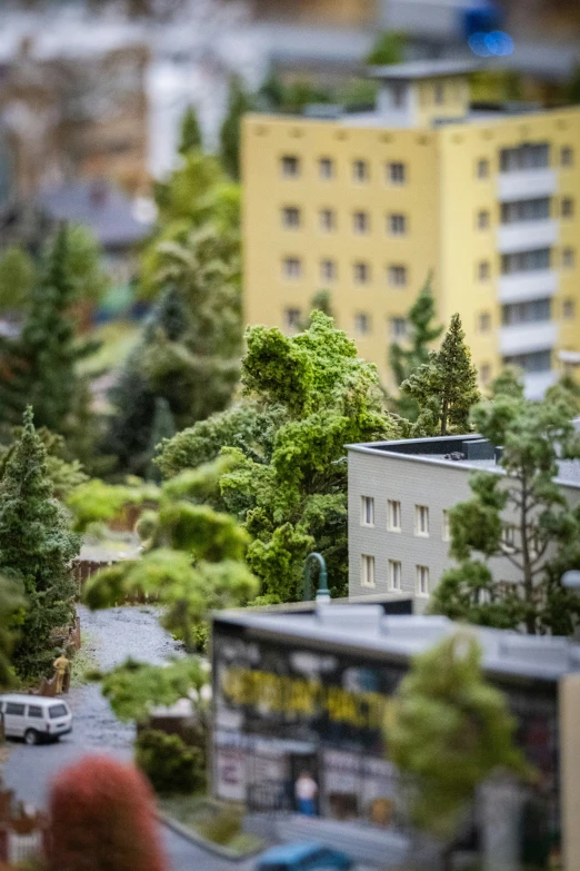 a blurry po shows a train and buildings