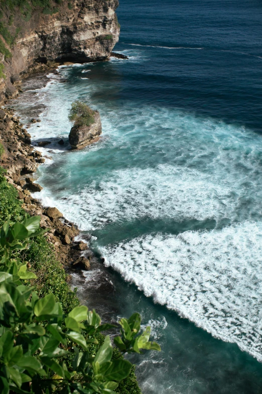 waves crashing onto shore near the shore line