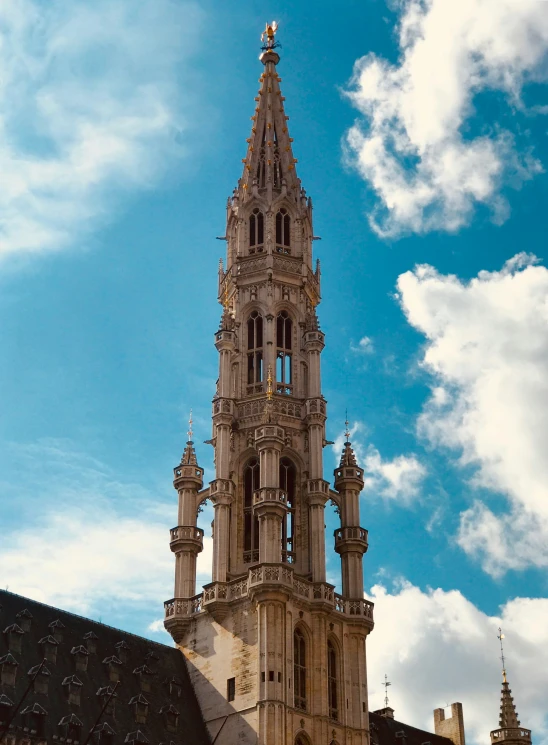 a large ornate building with steeples in front