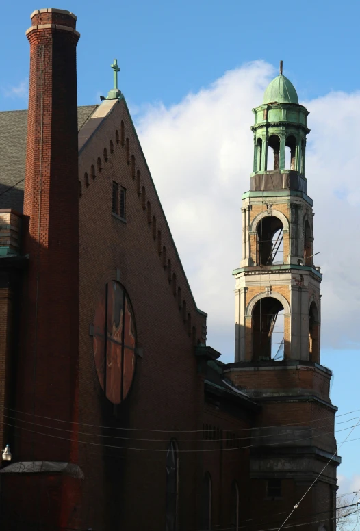 a large building has a clock at the top