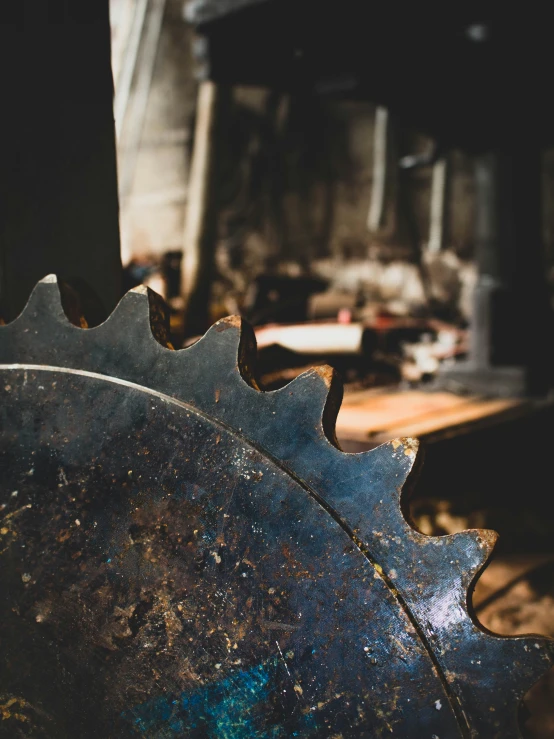 an old blue tool sits on the floor