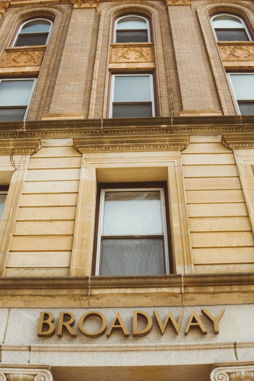 the words broadway are shown on the building