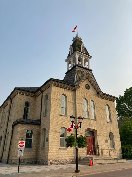 a church with a steeple and clock tower