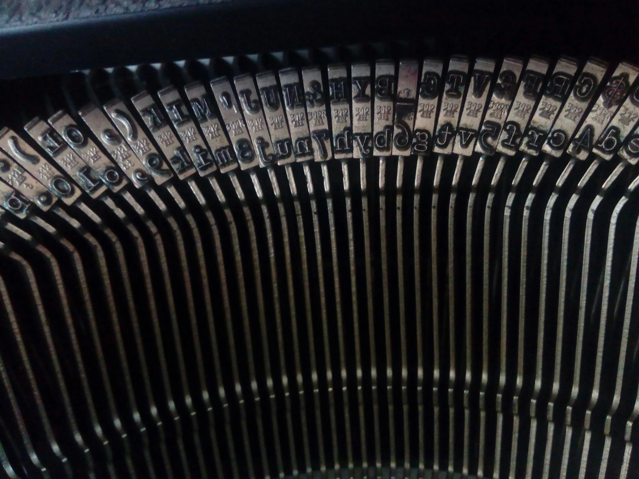 an old typewriter with black and white letters