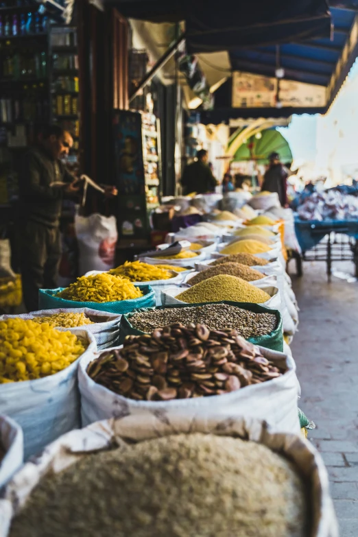 bags of food on sale at an outdoor market