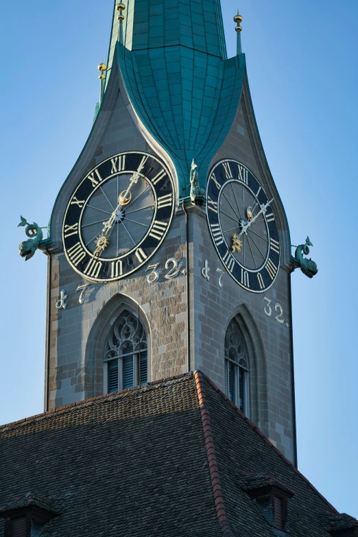 a big clock tower with a sky background