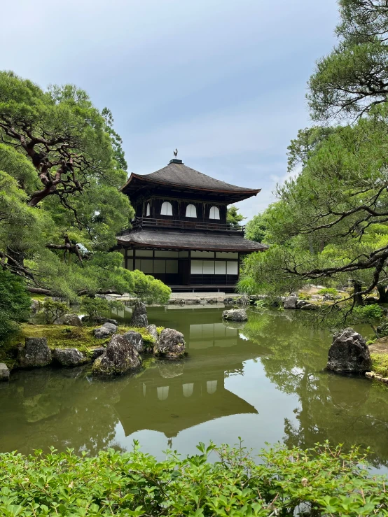 the oriental temple is located in the park with beautiful scenery